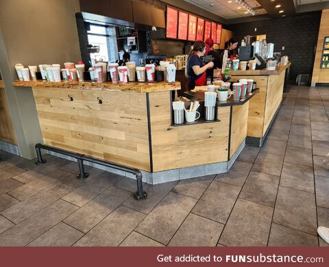 Starbucks is over an hour behind on their first "red cup day" and these are the abandoned