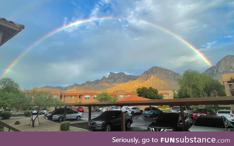 I took this picture of a rainbow outside my place.  Trump is not in it