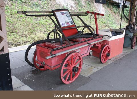 Hand operated fire engine, Kingswear station, Devon. Photo: 29 Aug 2019