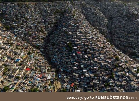 Houses sit on the slopes of the Jalousie neighborhood in Port-au-Prince, Haiti