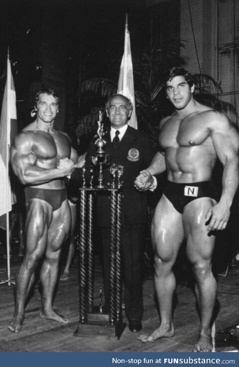 Arnold Schwarzenegger and Lou Ferrigno, making a man seem minuscule between them, 1970s