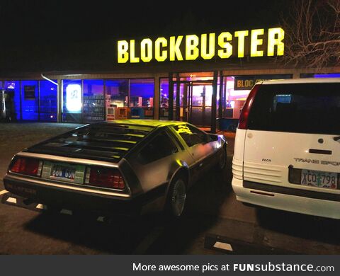 Delorean at Blockbuster, maybe renting something with john Oliver