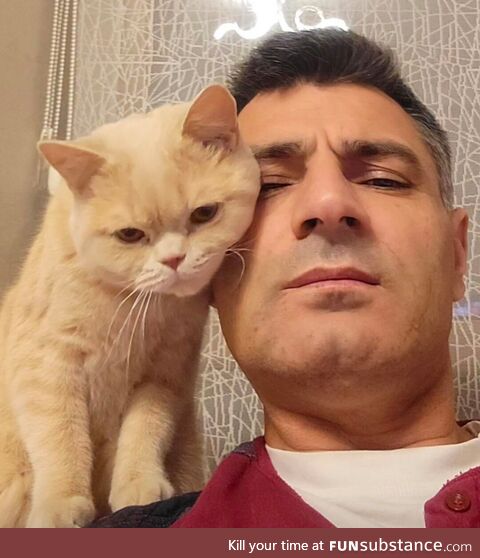 Olympic Shooter & Silver Medalist Yusuf Dikeç with his Cat