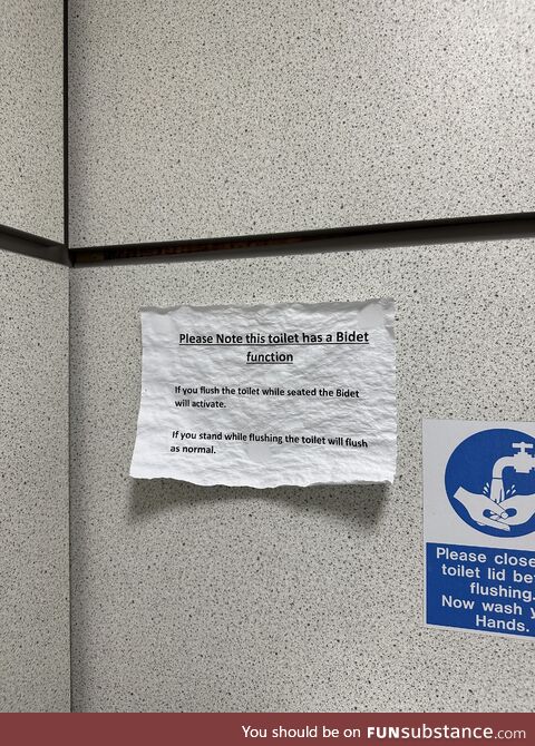 This sign saying the toilet now has a bidet has been soaked