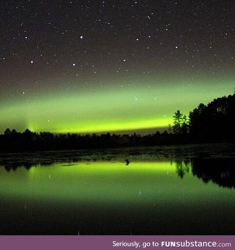 The beautiful northern lights with a star filled sky in norther Minnesota
