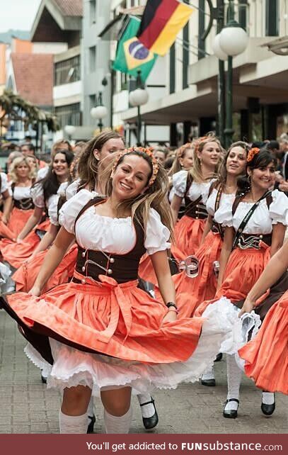 Women dancing at Oktoberfest in Blumenau, a city in Brazil founded by german settlers in