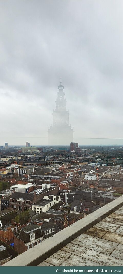 The reflection of this tower looks like it's a huge castle in the distance