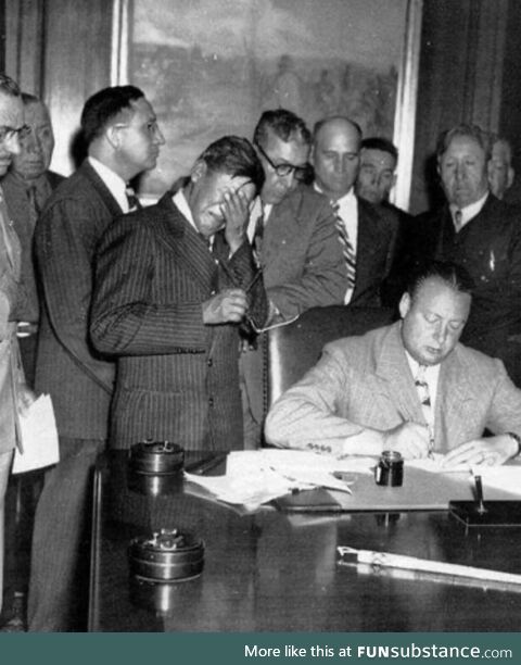 Tribal rep George Gillette crying as 154,000 acres of land is signed away for a new dam