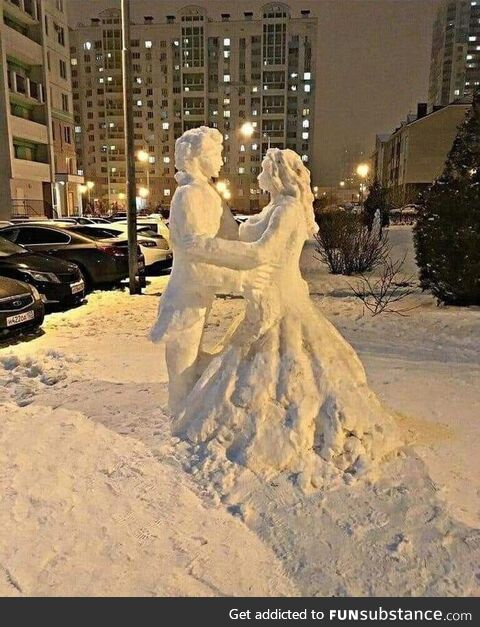 Someone made this beautiful snow couple