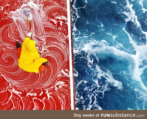 The color contrast between the red ship deck and blue whirling ocean here is incredible