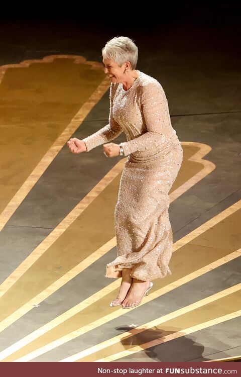 Jamie Lee Curtis celebrating EEAAO's best picture win at the Oscars