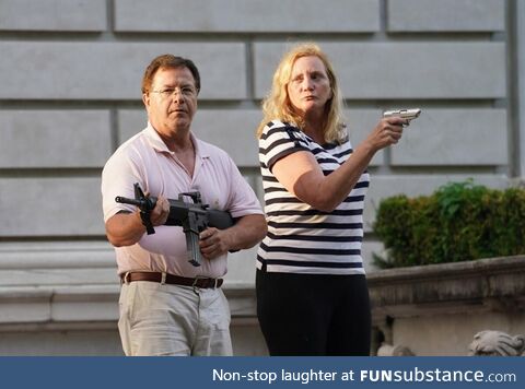 A woman lacking trigger discipline pointing a gun at protestors with her husband (6-27-20)
