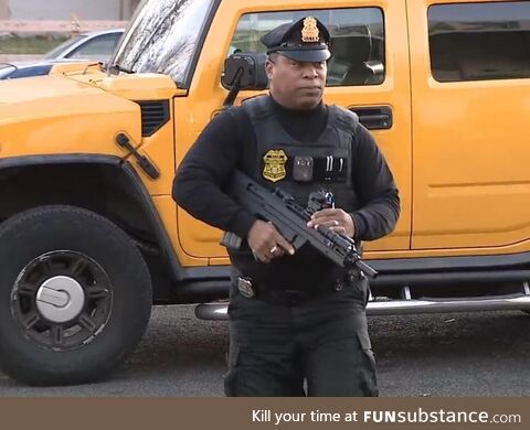 Philadelphia petrol station hires heavily armed guards as crime soars, this man is one of