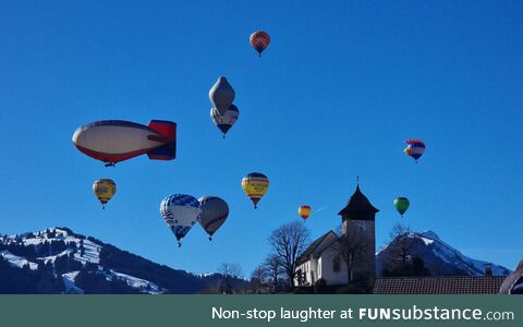Hot Air Balloon festival in the alps (Took this picture a couple of weeks ago)